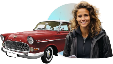 Lady standing in front of a red classic car